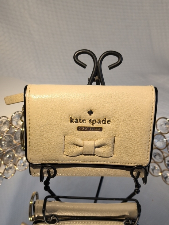kate spade Handbags - kate spade Cream Leather Bow Compact Crossbody Wallet